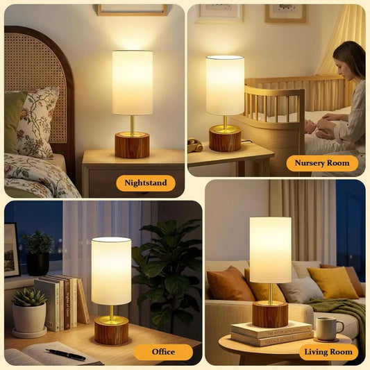 Table lamp with white fabric shade and faux wood base on a bedside table