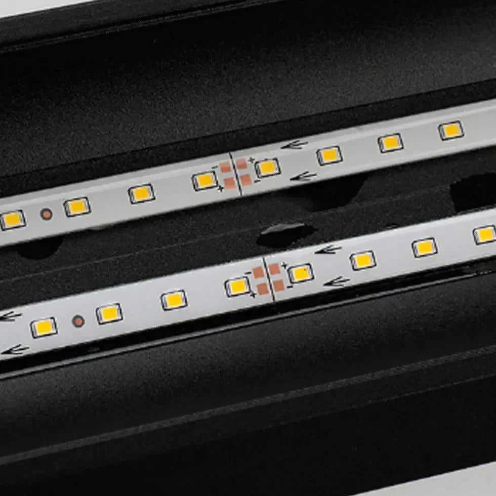 Black linear LED outdoor light bar with visible circuit and glowing LED modules