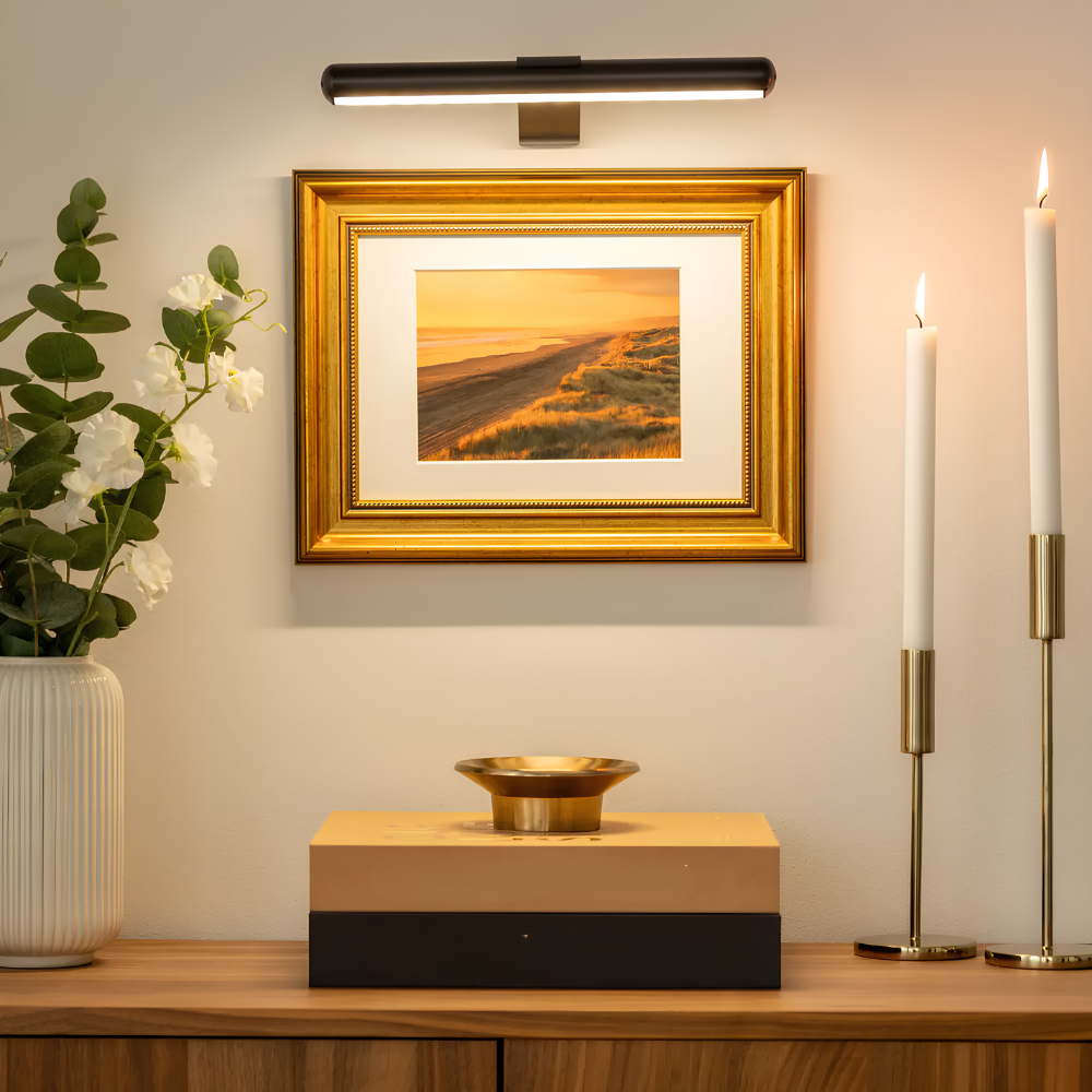 Black LED picture wall sconce with a slim bar housing and rectangular wall plate.