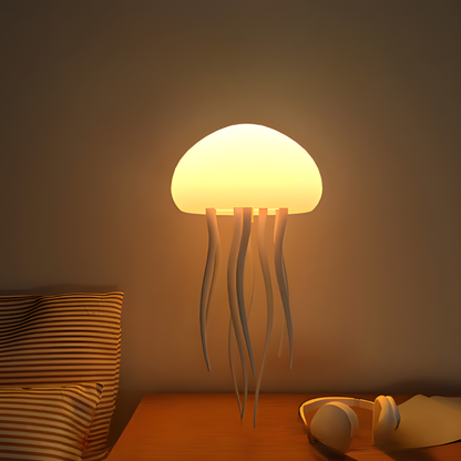 LED jellyfish night light with warm glowing dome and white tentacles