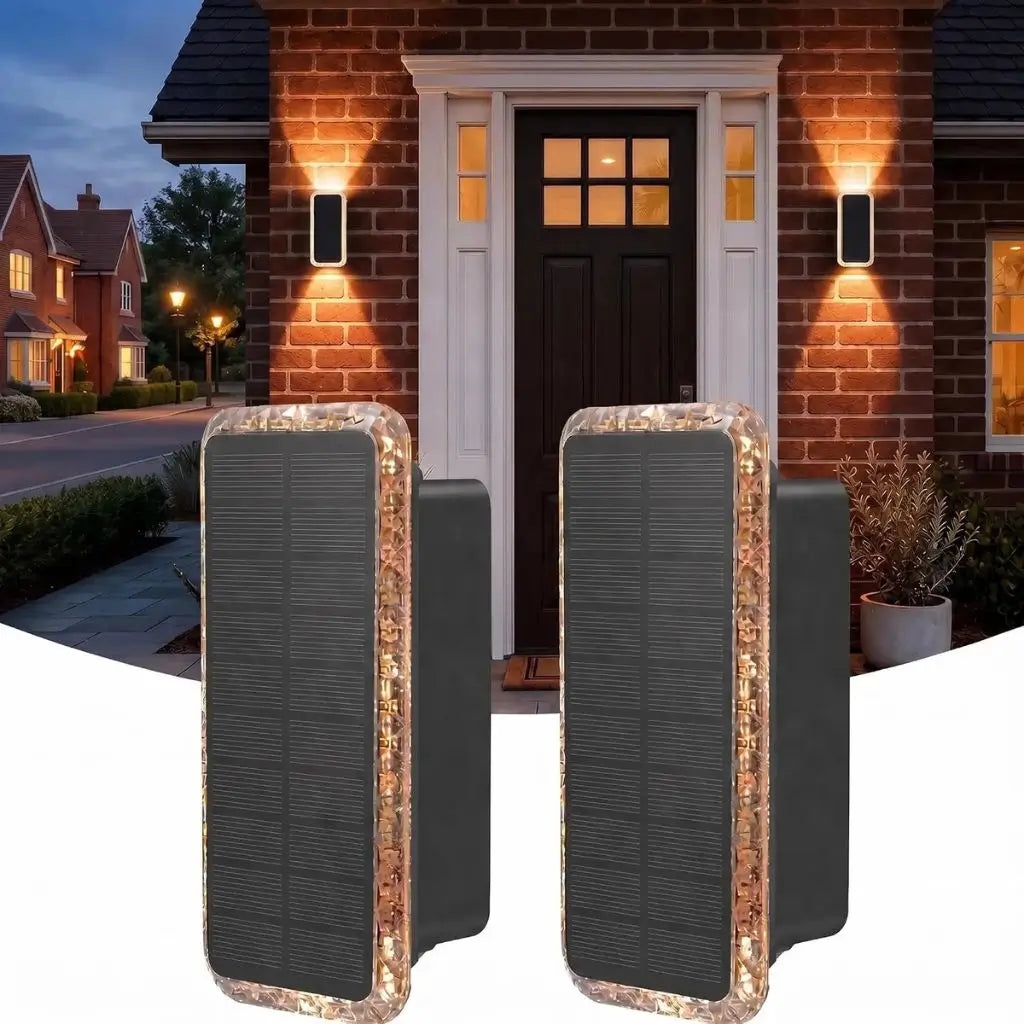 Set of two outdoor solar wall lights with warm vertical up-and-down glow by door