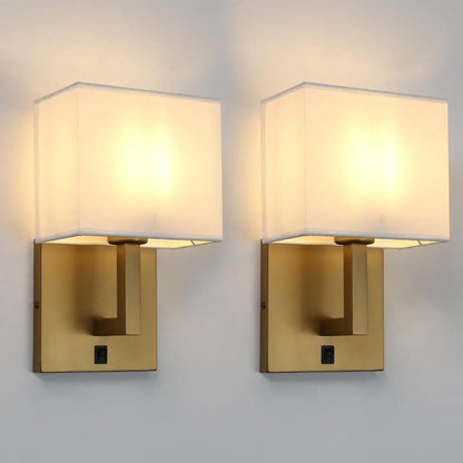 Pair of antique gold wall lamps with white fabric rectangular shades