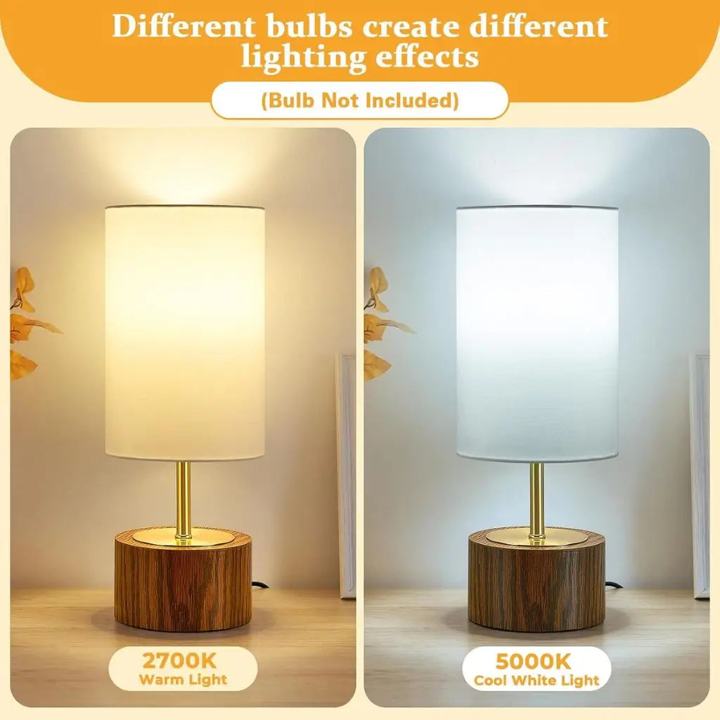 Table lamp with white fabric shade and faux wood base showing warm and cool lighting