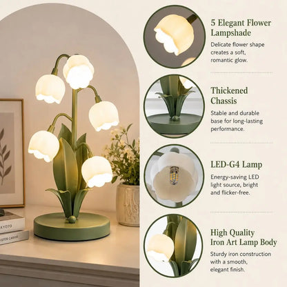 Green flower table lamp with five lily of the valley style glass shades on base