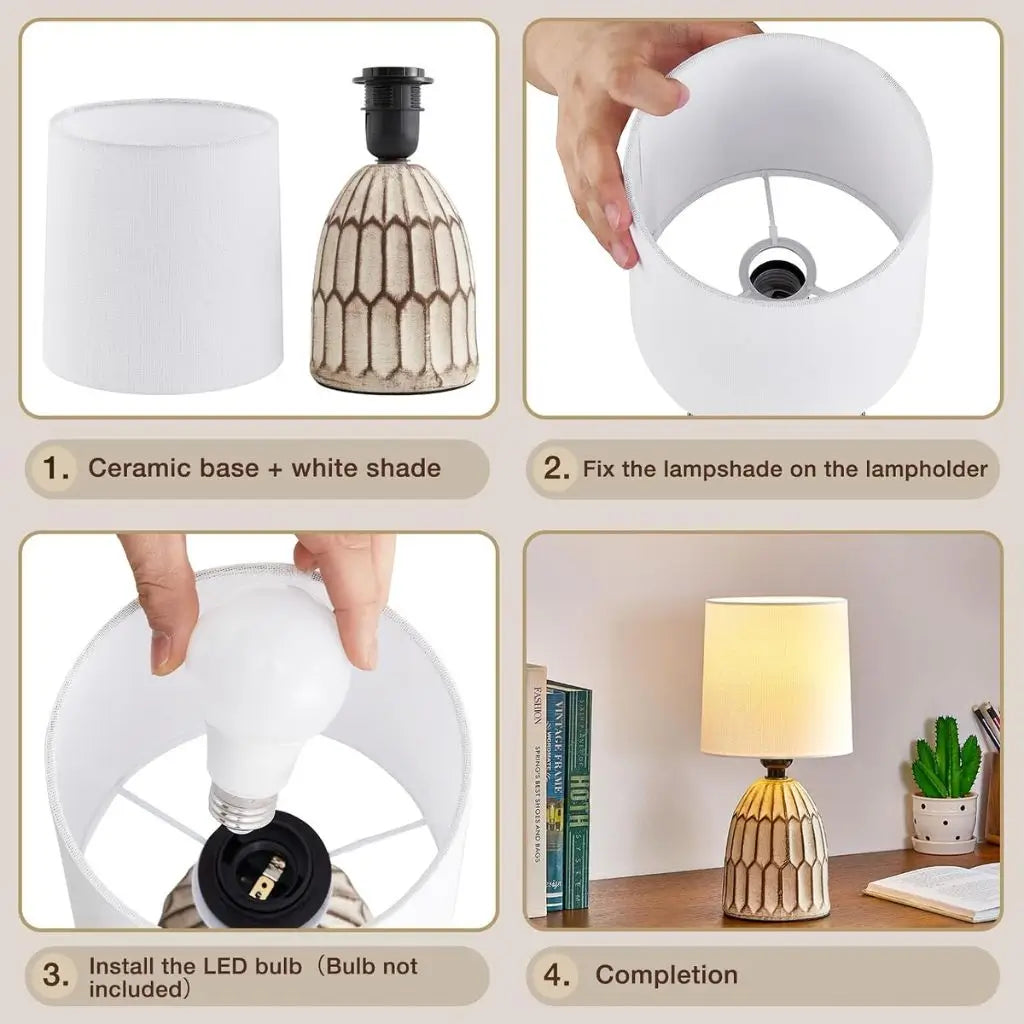 Ceramic lamp with white fabric shade being fitted onto patterned gold base