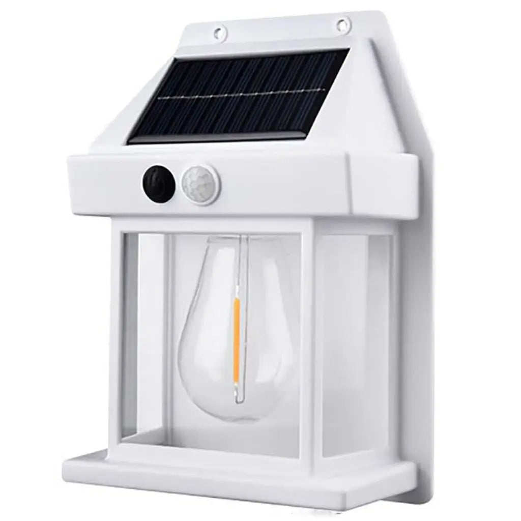 White solar-powered fence wall light with clear lamp cover and solar panel