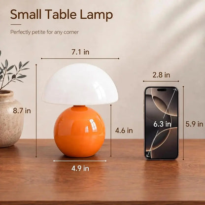 Small orange ceramic mushroom lamp with frosted glass dome shade, compact size