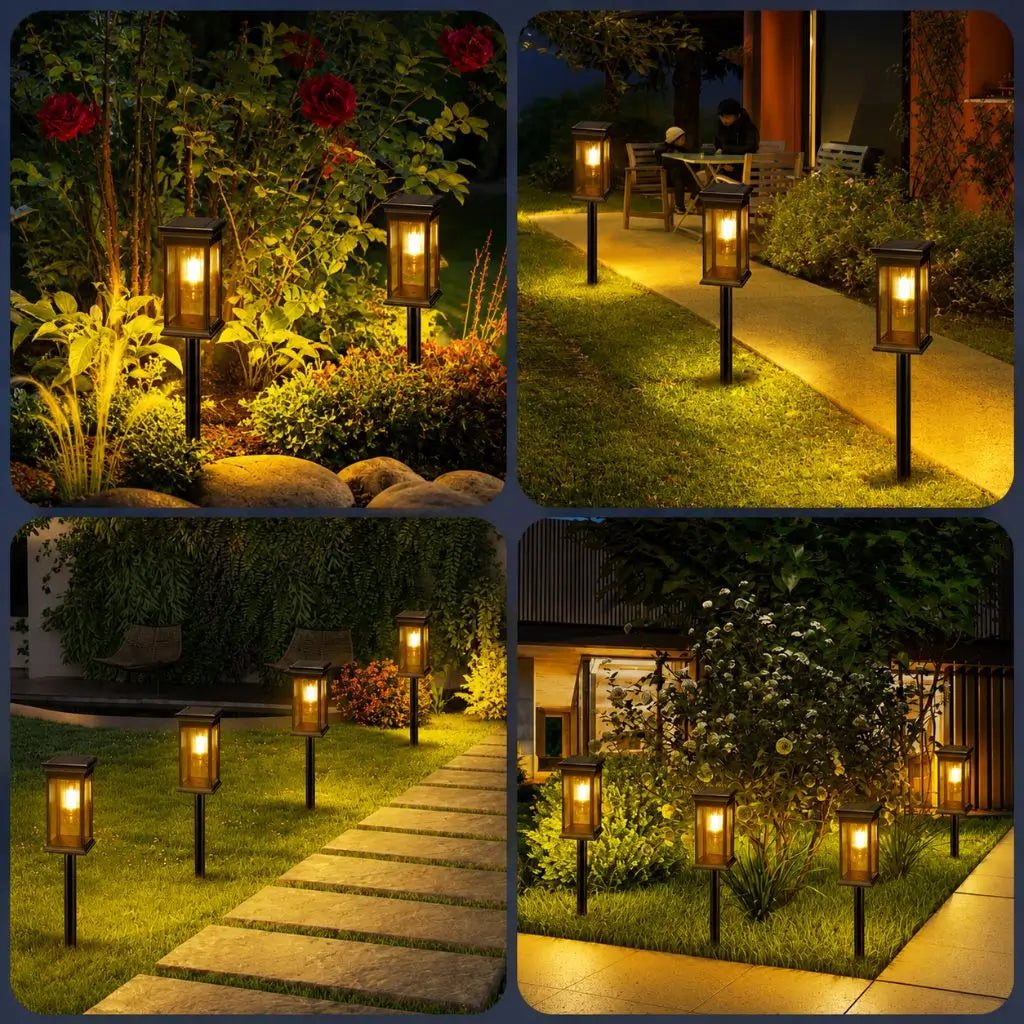 Solar garden pathway lantern lights glowing warm white on black metal posts
