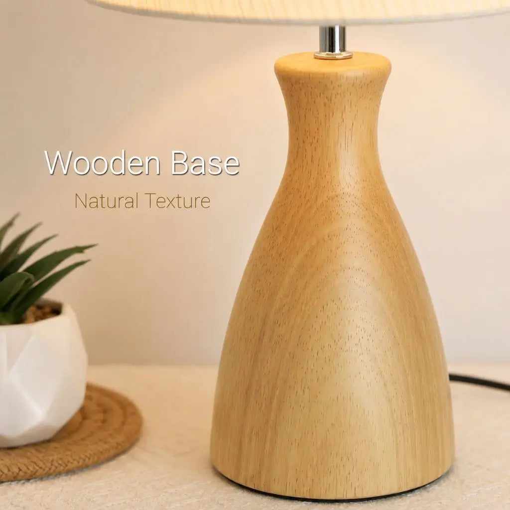 Wooden table lamp base with metal stem and light fabric shade