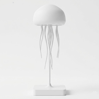 LED jellyfish night light on white base, white dome and hanging tentacles