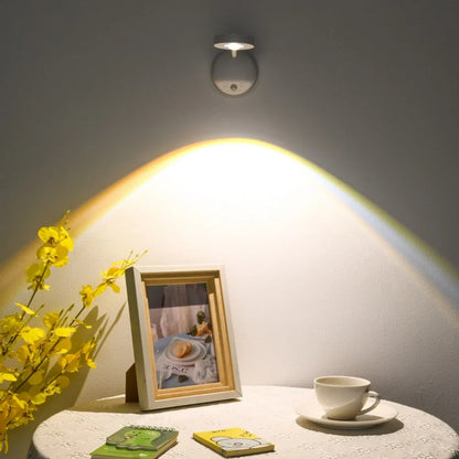 Wireless motion sensor LED wall light with warm halo glow on wall