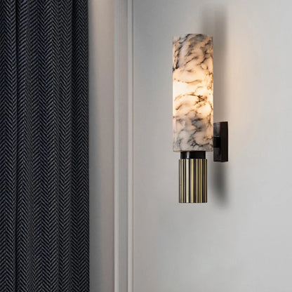 Wall light with marble-effect cylinder shade, black side mount, gold ribbed body