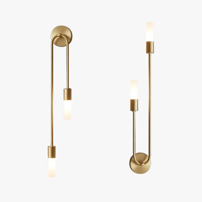 Pair of gold LED wall lights with curved backplates and warm white cylinder shades