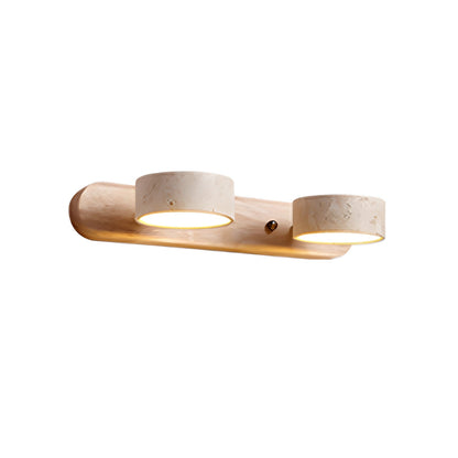 LED wall light with wood-look base and two stone-look cylinder shades, warm glow