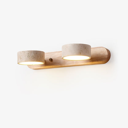LED wall light with three stone-look cylinder shades on a wood-look wall bar