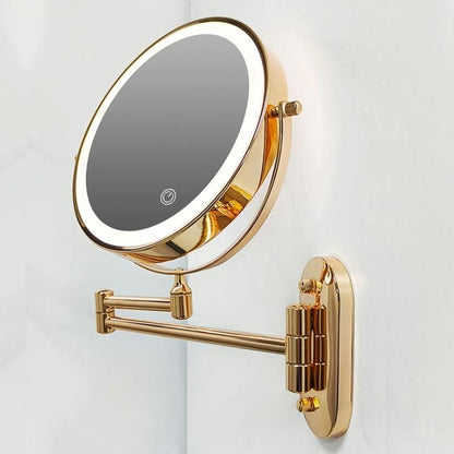 Wall-mounted round cosmetic mirror with gold frame and LED light ring swing arm