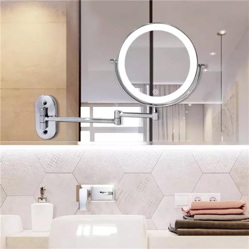 Wall-mounted chrome LED magnifying mirror with round light ring and support bar