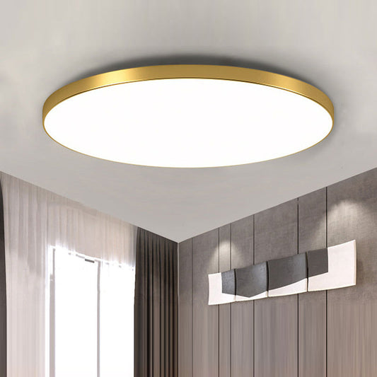 Gold-toned round LED flush-mount ceiling light with flat acrylic diffuser