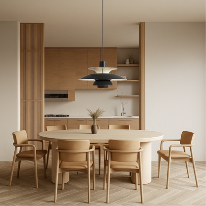 Black pendant light with layered shades over round kitchen table