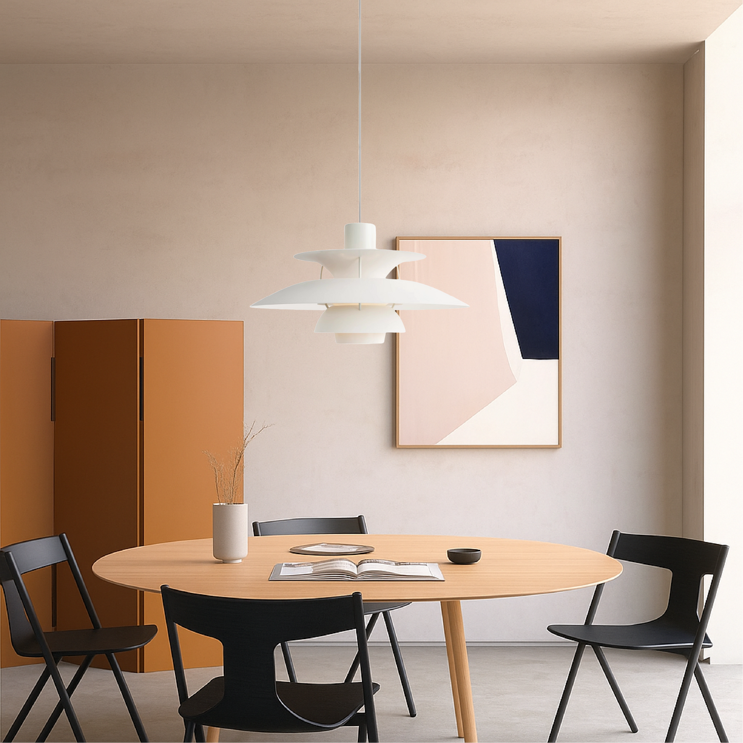 White pendant light with stacked bell shades, corded drop above modern dining set