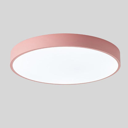 Round ceiling light with white acrylic diffuser and pink metal rim