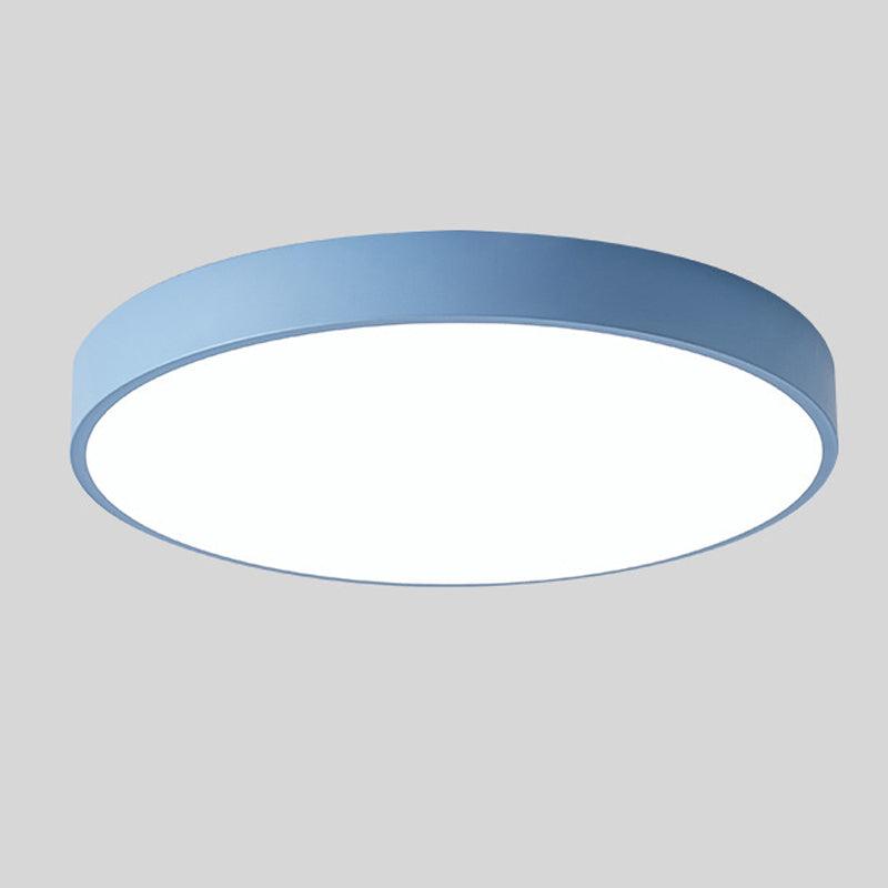 Round ceiling light with white acrylic diffuser and blue metal rim