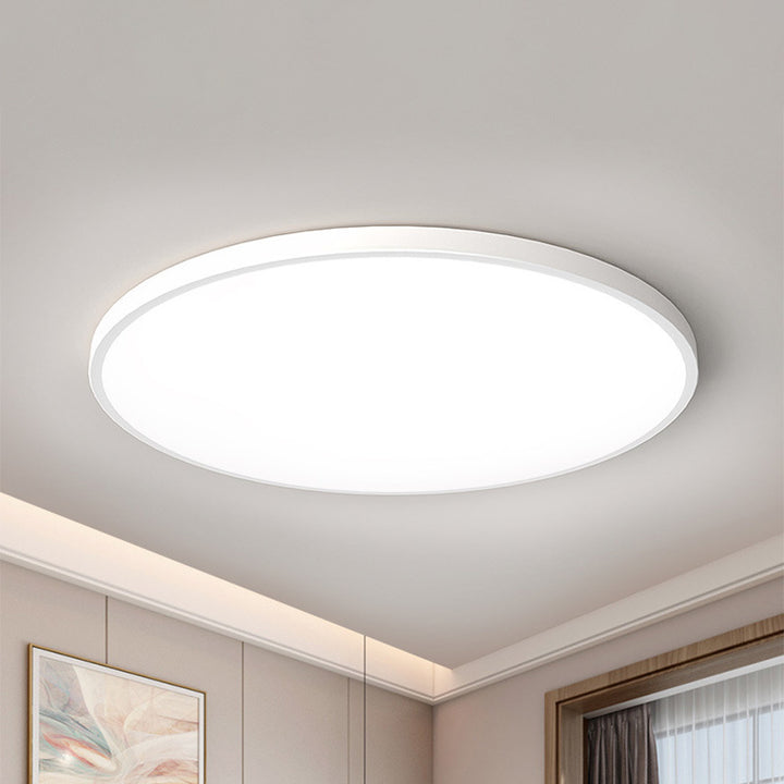Light gray round flat LED flush-mount ceiling light with white diffuser