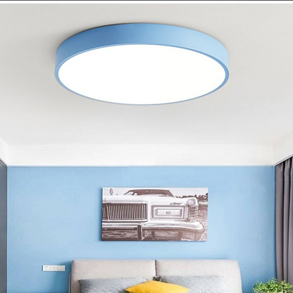 Round ceiling light with white acrylic diffuser and blue metal rim