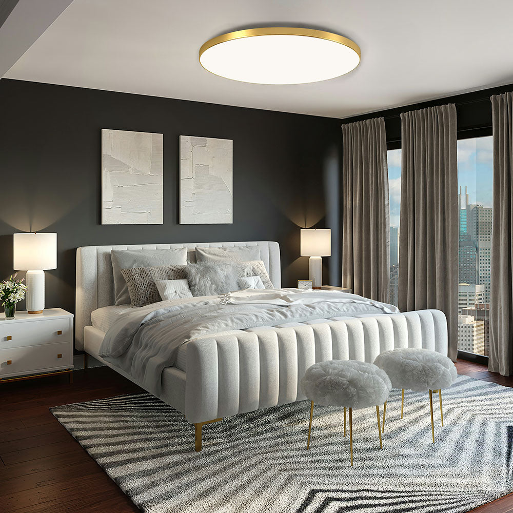 Round LED ceiling light with frosted acrylic panel and gold-tone metal trim.