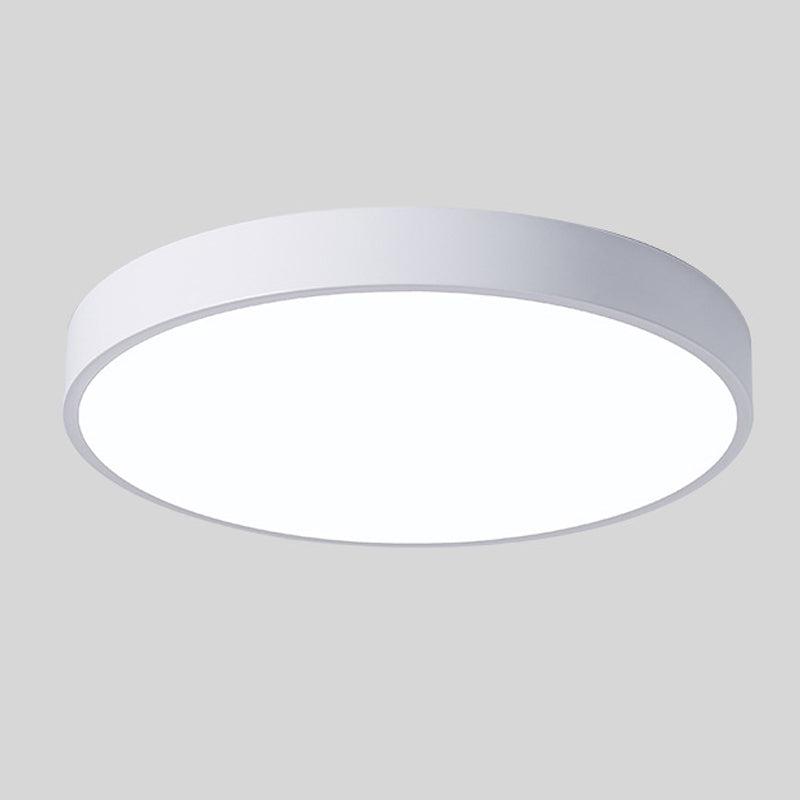 Round ceiling light with white acrylic diffuser and light gray metal rim
