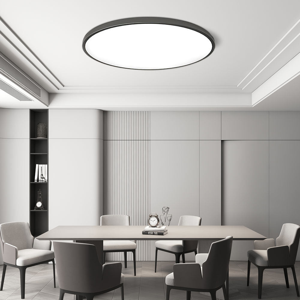 Round flat LED ceiling light with frosted acrylic diffuser and gray metal rim.