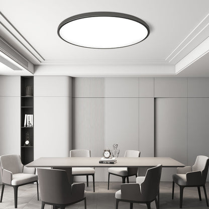 Round flat LED ceiling light with frosted acrylic diffuser and gray metal rim.