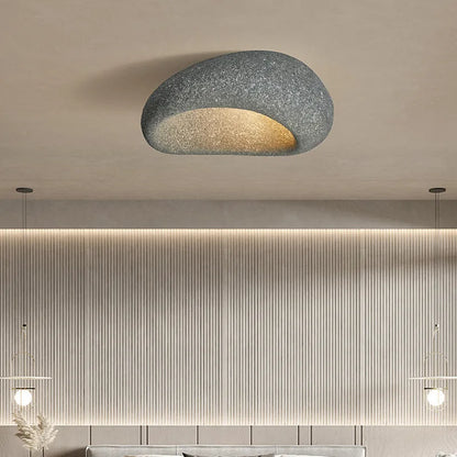 Rustic LED ceiling light in dark gray textured metal, round flush mount with warm glow