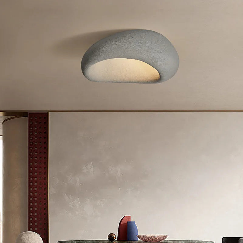 Rustic LED ceiling light in dark gray textured metal, compact flush mount with warm glow