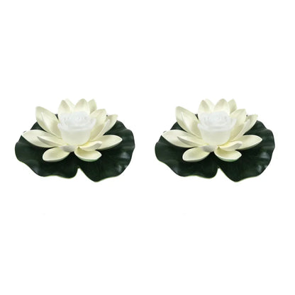 Pair of white floating lotus pond lights with white center roses and dark green leaves