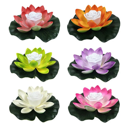 Assorted floating lotus LED pond lights: red, orange, green, purple, white, and pink