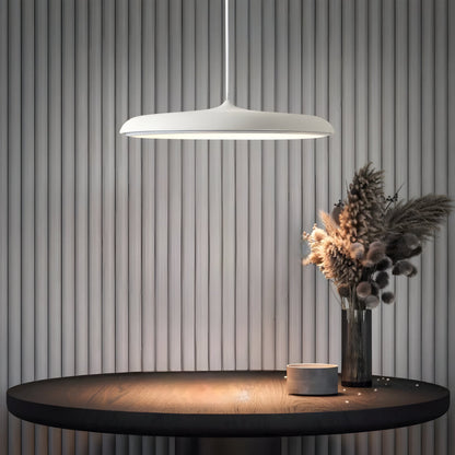 White metal Scandinavian pendant light with wide dome shade over round table