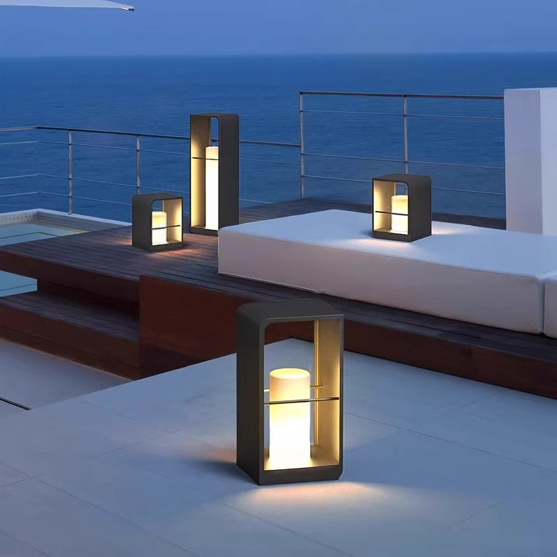 Black metal LED outdoor lantern lights with warm glow, rectangular glass sides