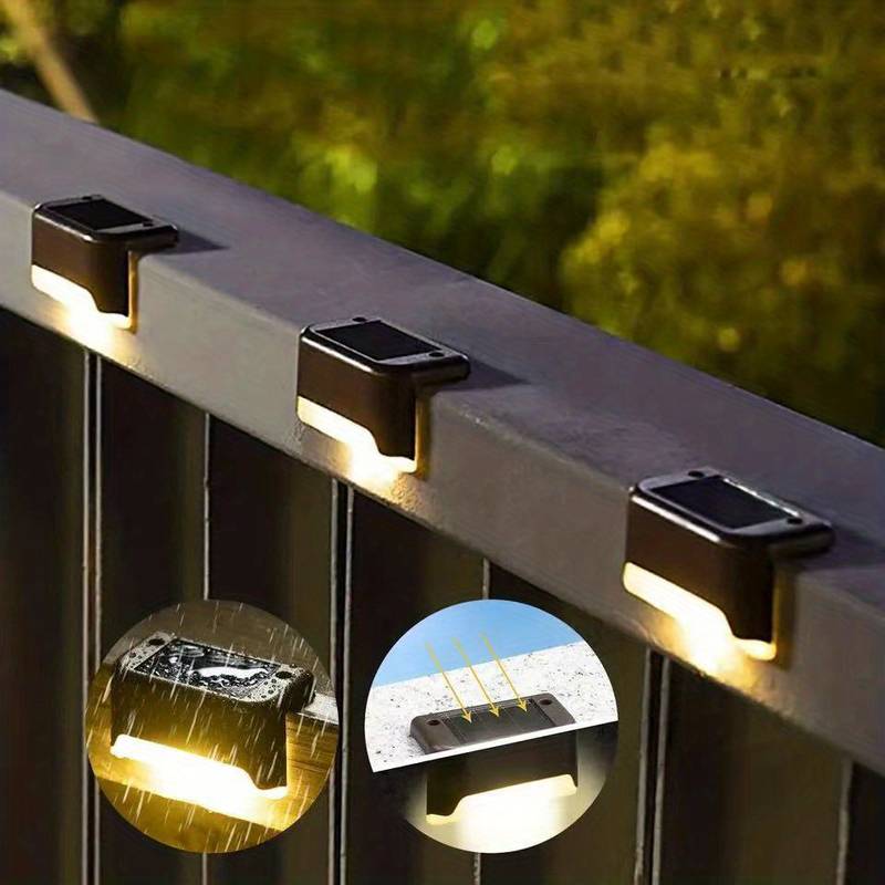 Solar LED outdoor wall light fixtures with warm white glow and black housings