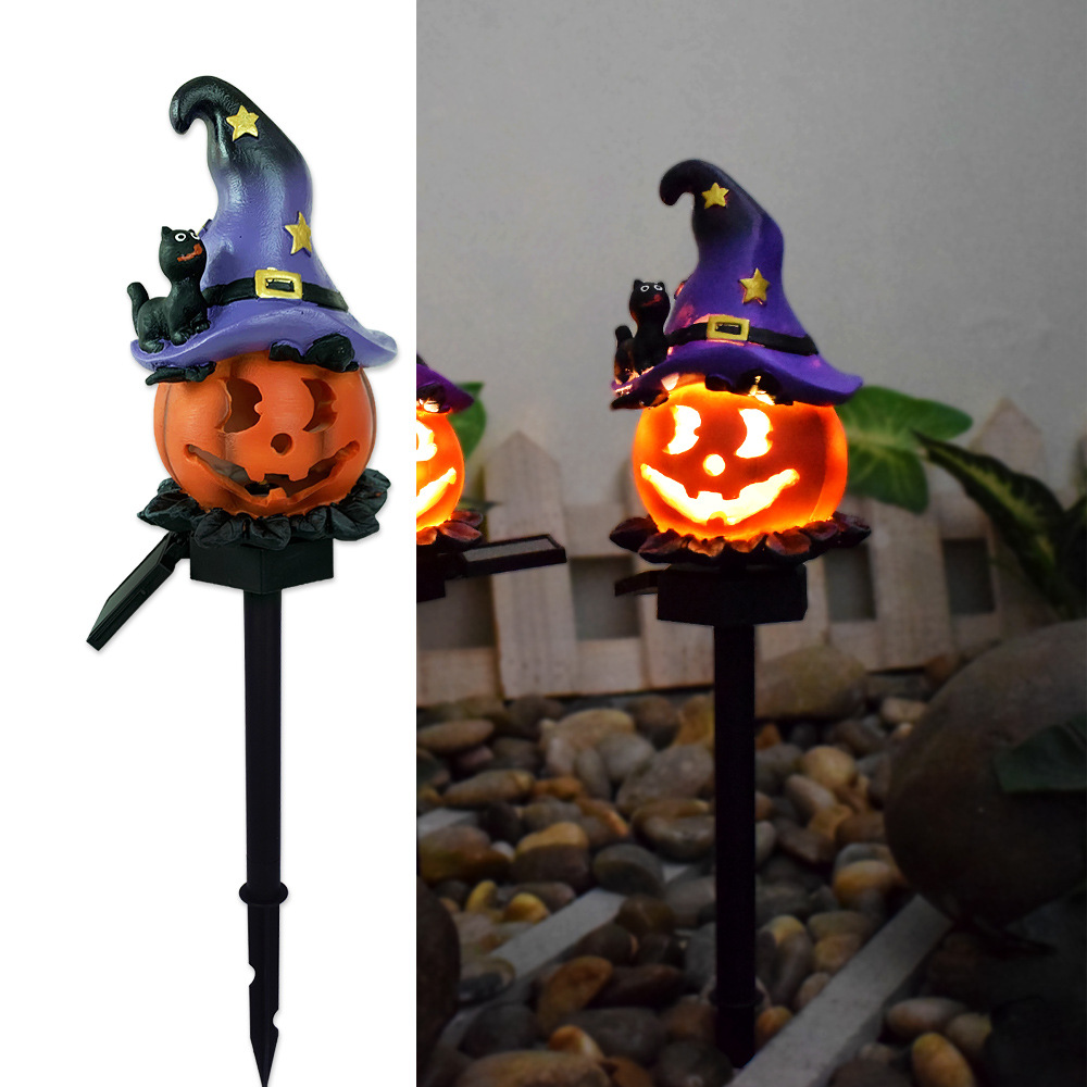 Solar Halloween garden light: orange jack-o'-lantern with purple witch hat and cat figure