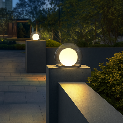 Outdoor LED ball garden lamp with clear globe, warm light, and dark square base